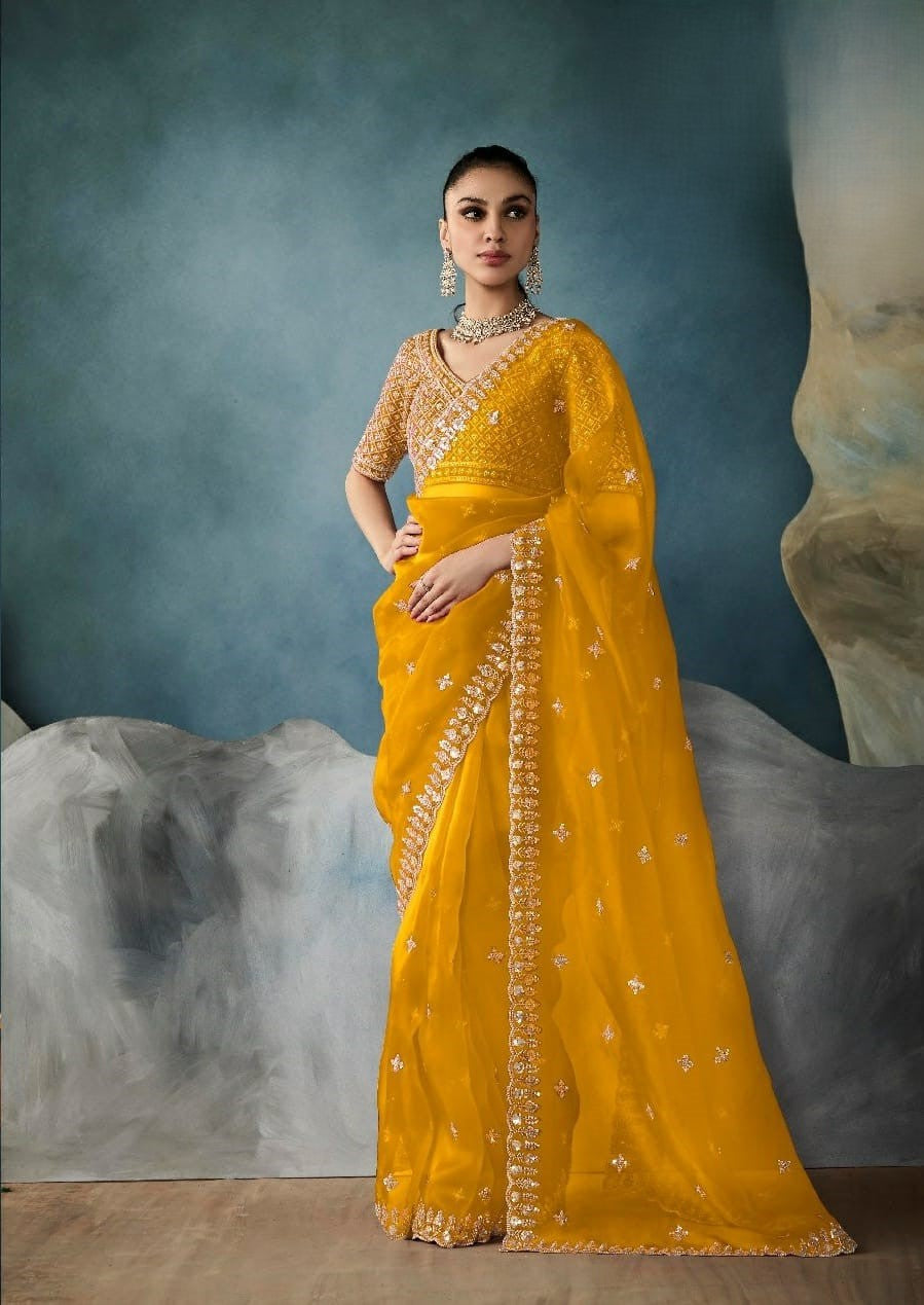 Kimora Sarees Feature Pure Fancy-Based Fabric That Offers A Luxurious Feel And Elegant Drape