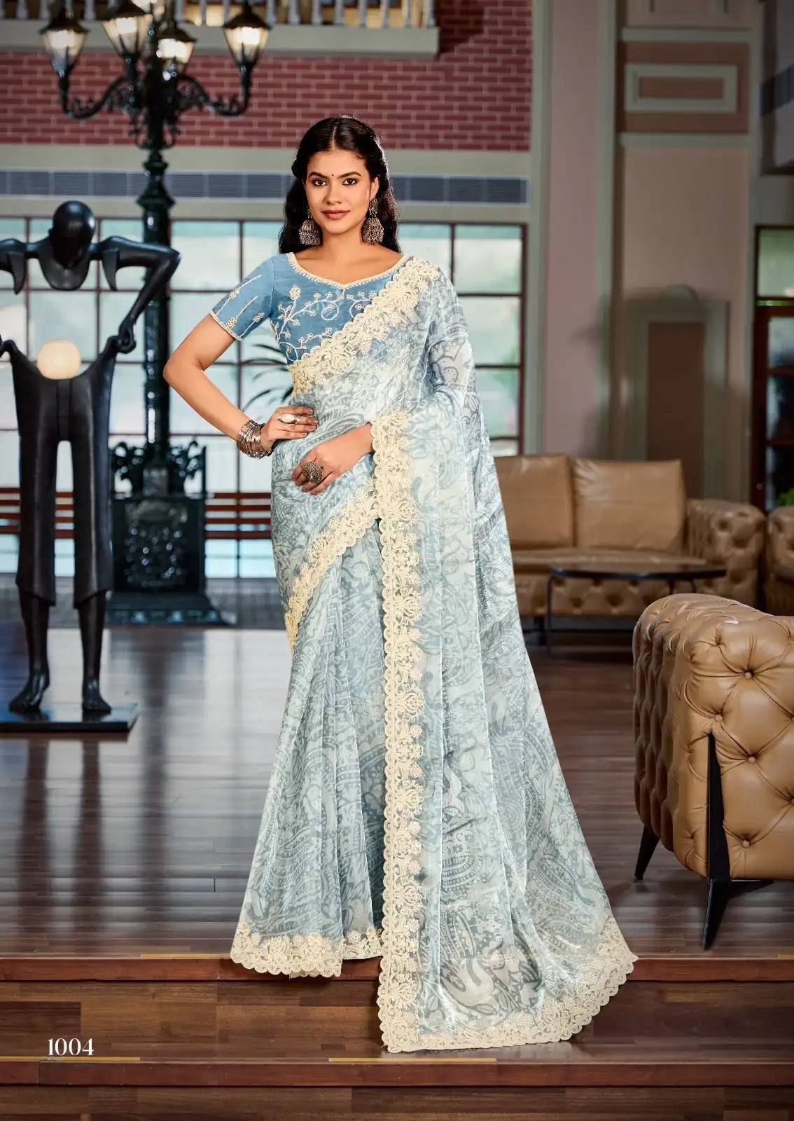 Stavan Sarees Showcase The Richness Of Heavy Burberry Fabric Enhanced By An Intricate Embroidered Cutwork