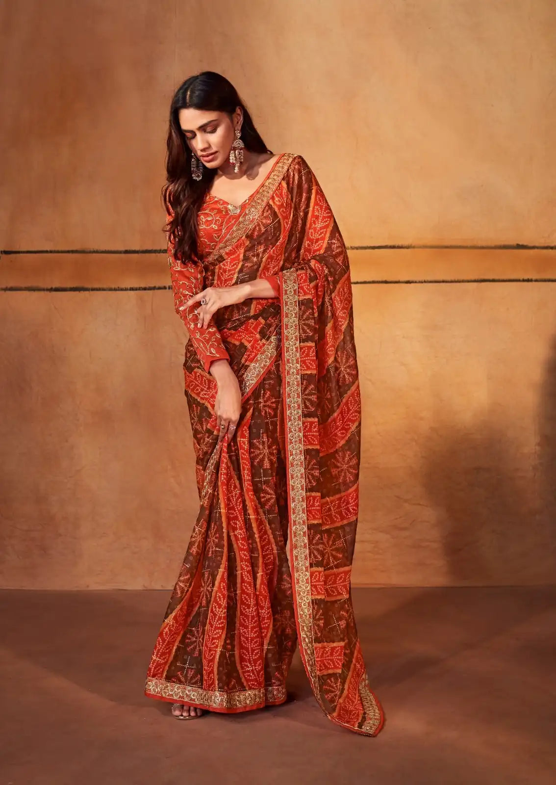 Stavan Sarees Showcase The Elegance Of Pure Chiffon Fabric Enhanced By A Meticulously