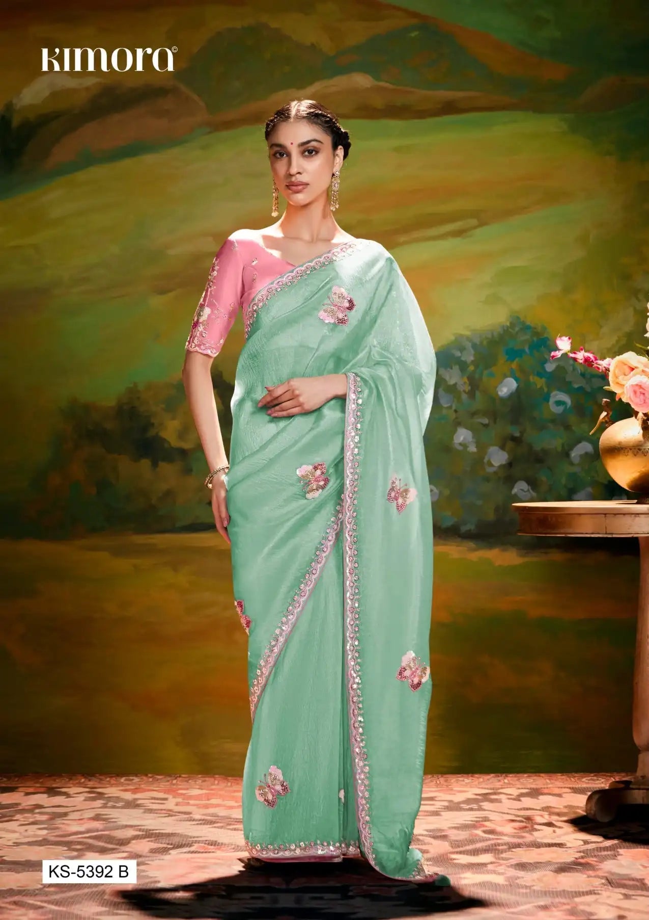 The Kimora Saree Is Crafted From Fine Organza Fabric Offering A Lightweight And Elegant Drape