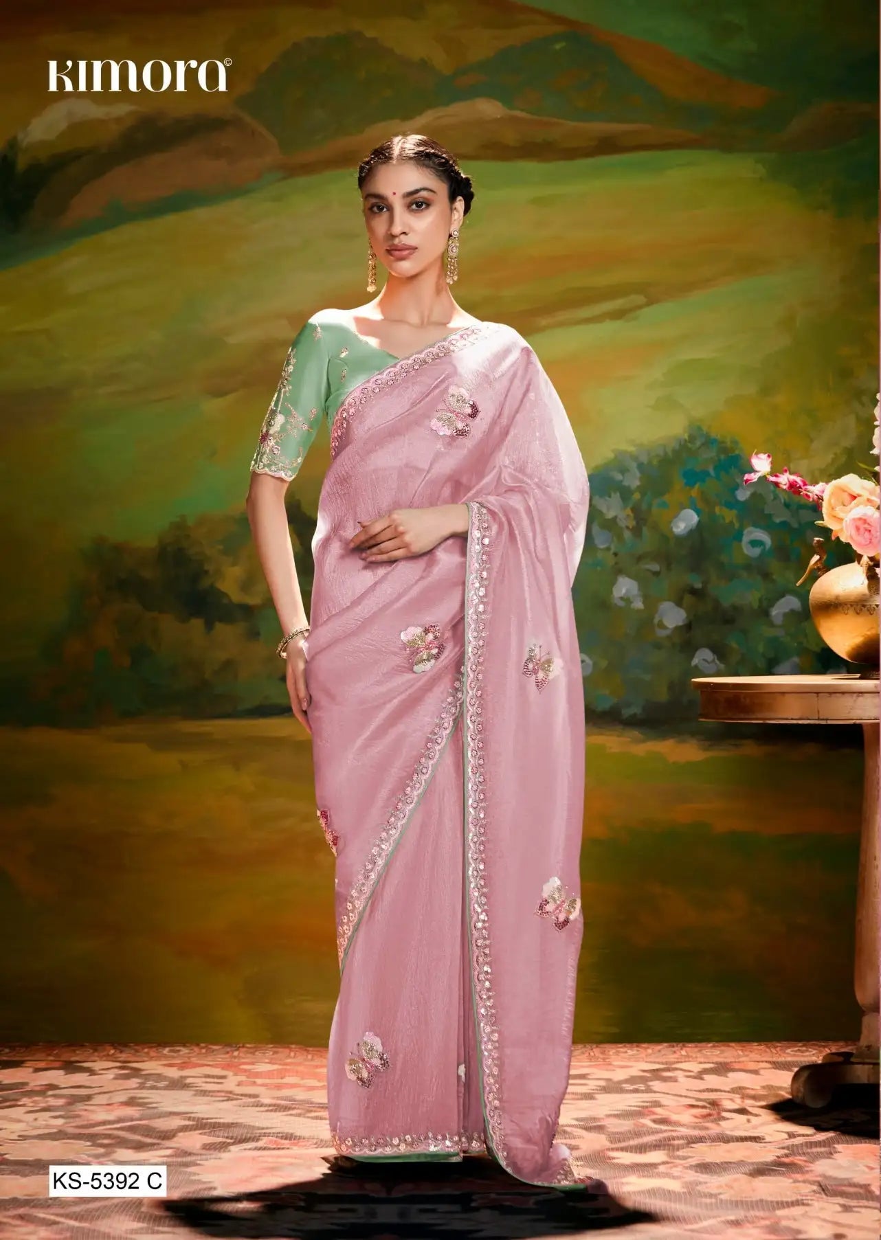 The Kimora Saree Is Crafted From Fine Organza Fabric Offering A Lightweight And Elegant Drape