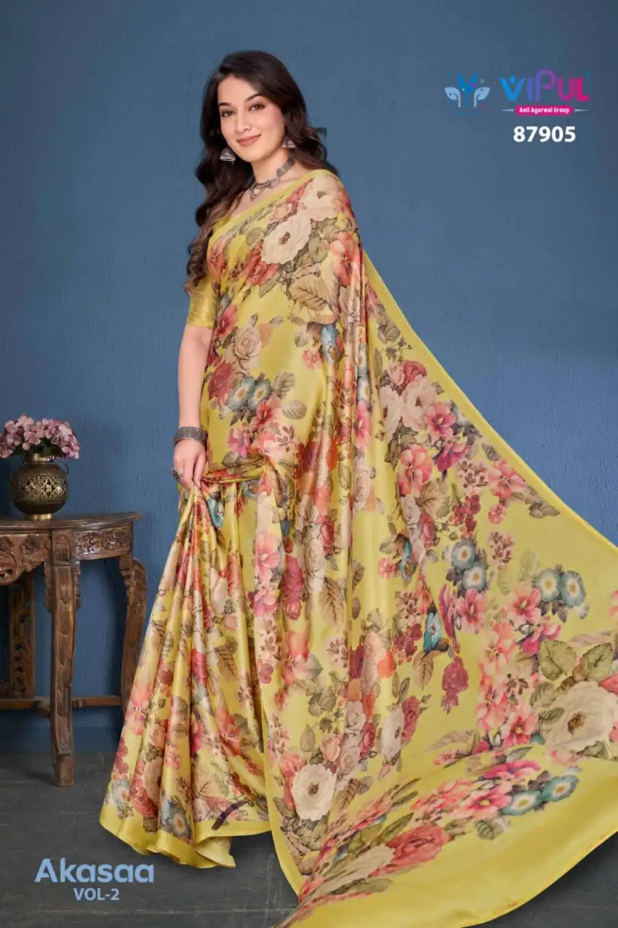 Vipul Sarees Crafted From Satin Silk Offer A Luxurious Blend Of Smooth Texture And Eegant Sheen