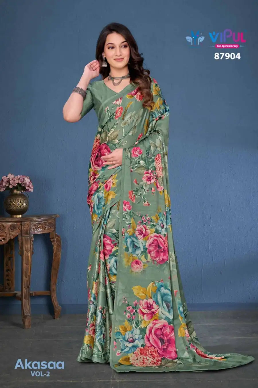 Vipul Sarees Crafted From Satin Silk Offer A Luxurious Blend Of Smooth Texture And Eegant Sheen