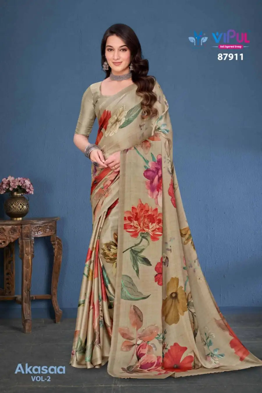 Vipul Sarees Crafted From Satin Silk Offer A Luxurious Blend Of Smooth Texture And Eegant Sheen