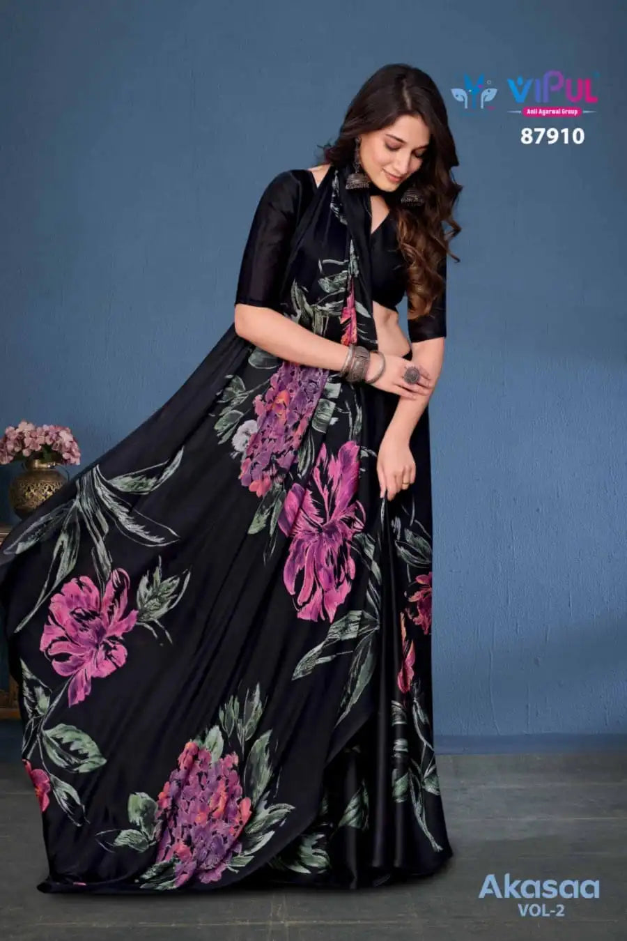 Vipul Sarees Crafted From Satin Silk Offer A Luxurious Blend Of Smooth Texture And Eegant Sheen