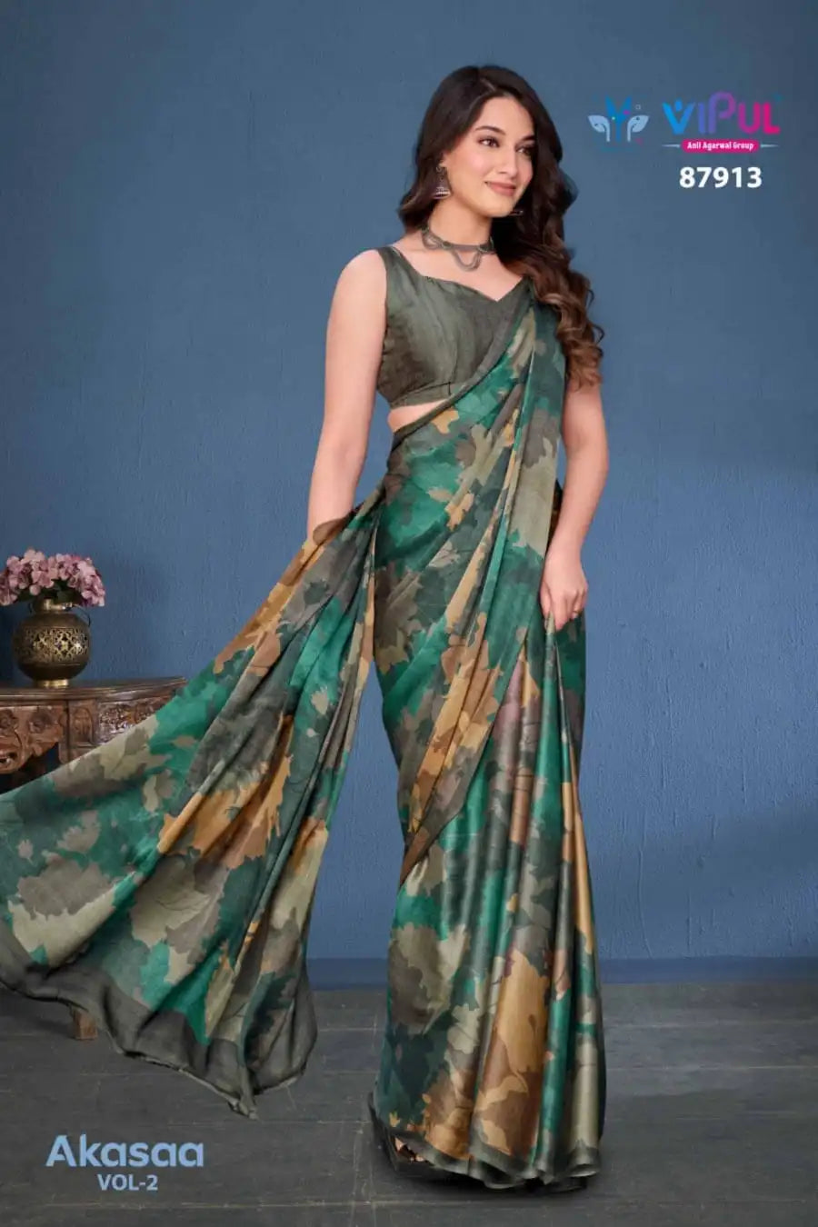 Vipul Sarees Crafted From Satin Silk Offer A Luxurious Blend Of Smooth Texture And Eegant Sheen