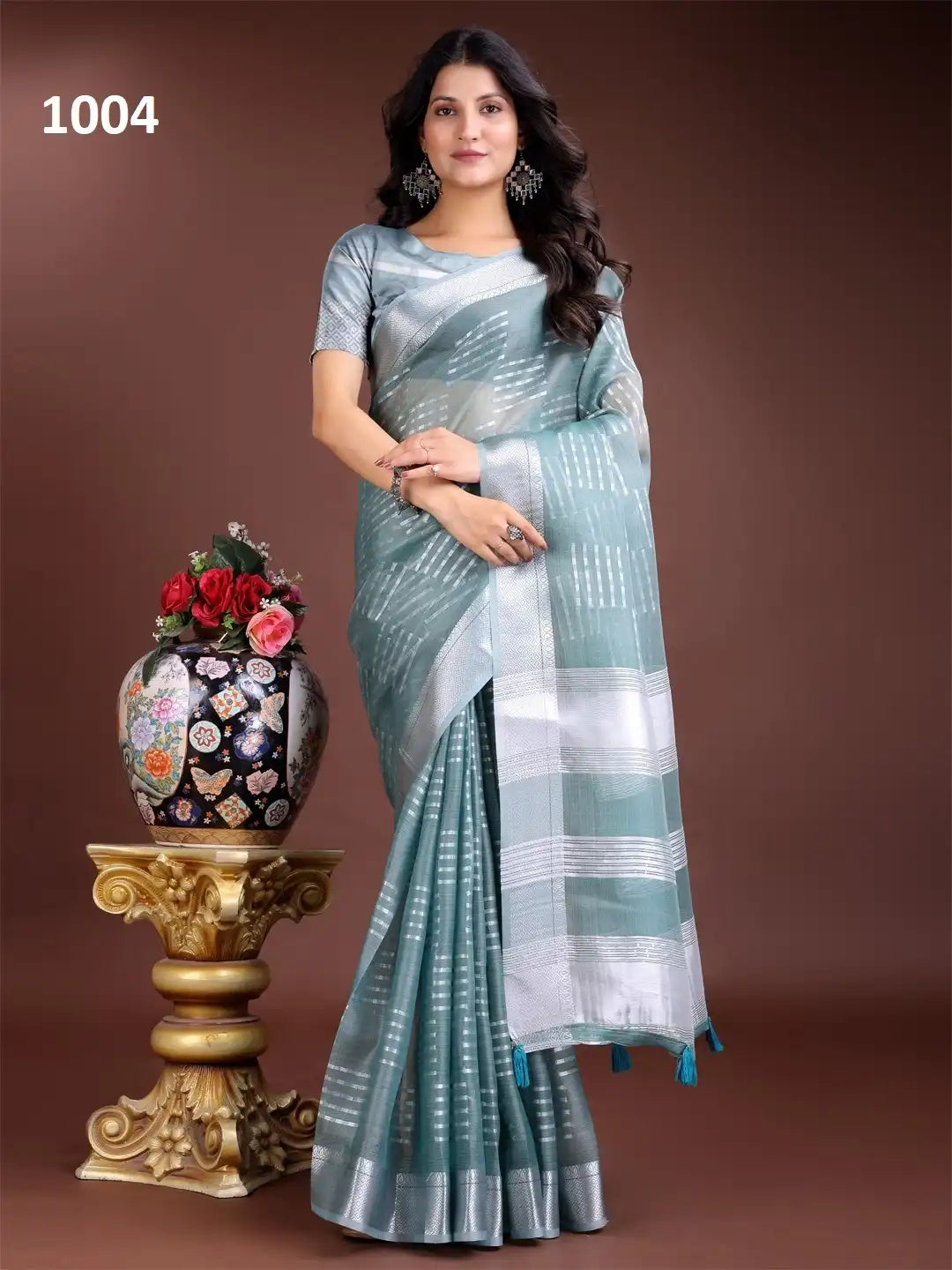 ASTITA Sarees Crafted With Delicate Organza Fabric Offer A Refined Blend Of Elegance And Lightweight Comfort