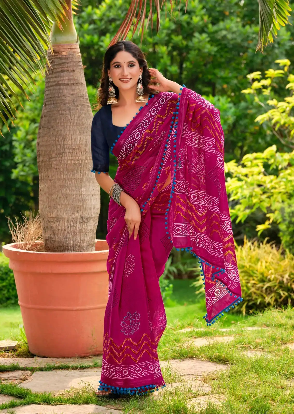 S.R. Sarees Crafted From Mul Mul Cotton Fabric Offer Exceptional Softeness And Breathability Making Them Ideal For Comfortable Wear