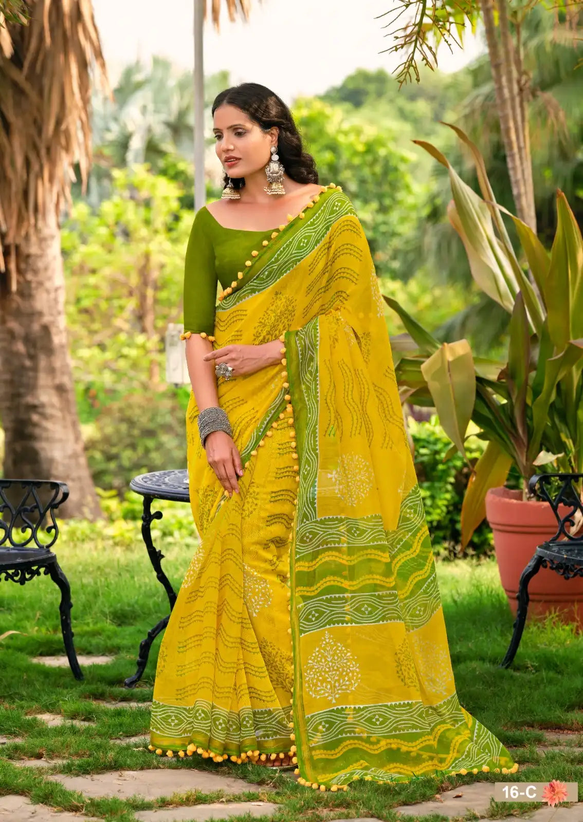 S.R. Sarees Crafted From Mul Mul Cotton Fabric Offer Exceptional Softeness And Breathability Making Them Ideal For Comfortable Wear