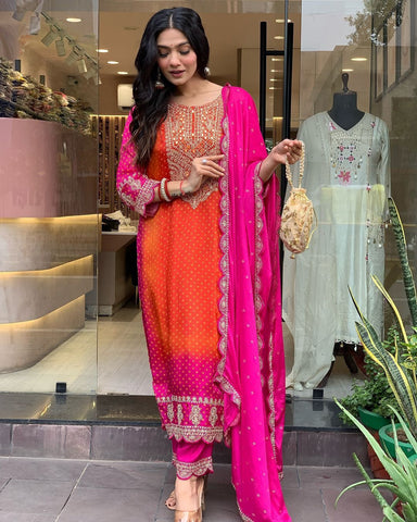 Radiant Elegance: Orange-Pink Silk Embroidered Ceremonial Salwar Suit"