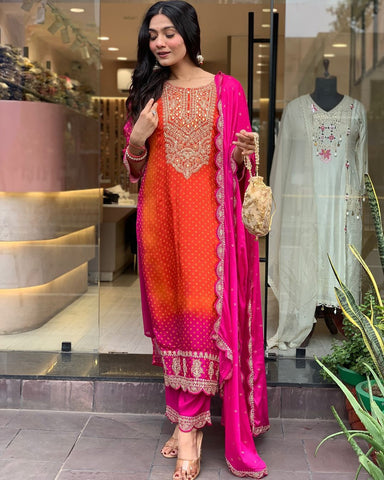 Radiant Elegance: Orange-Pink Silk Embroidered Ceremonial Salwar Suit"