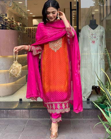 Radiant Elegance: Orange-Pink Silk Embroidered Ceremonial Salwar Suit"