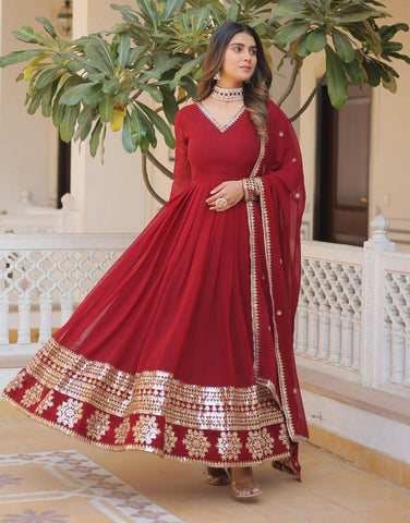 Maroon Colored Faux Georgette Sequins Embroidered Gown With Dupatta