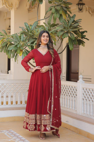 Maroon Colored Faux Georgette Sequins Embroidered Gown With Dupatta