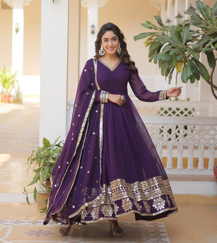 Purple Colored Faux Georgette Sequins Embroidered Gown With Dupatta